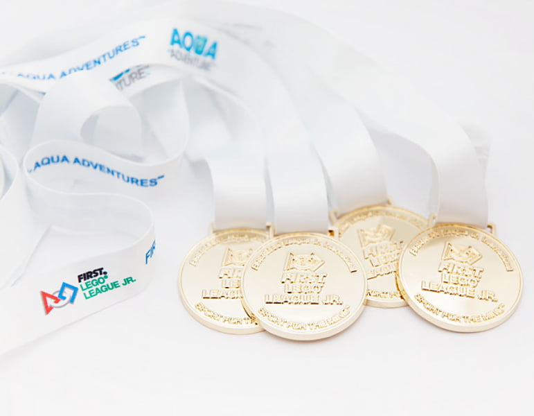 Explore medalje med bånd